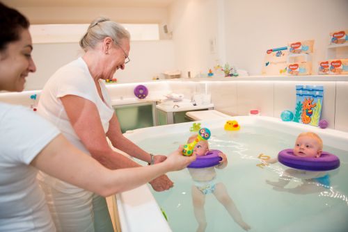 Notting Hill Baby Spa - Hydrotherapy pool and massage experience for babies using an infant neck float